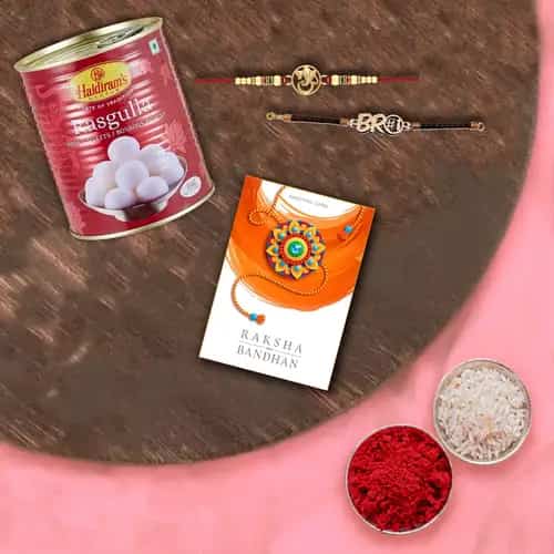 Tempting Haldiram Rosogollas with 2 Rakhis and Roli Tilak Chawal Tempting Haldiram Rosogollas with 2 Rakhis and Roli Tilak Chawal