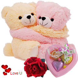 Cute Hugging Couple Teddy with 1 Velvet Rose and 3 pcs Heart Homemade Chocolate Cute Hugging Couple Teddy with 1 Velvet Rose and 3 pcs Heart Homemade Chocolate