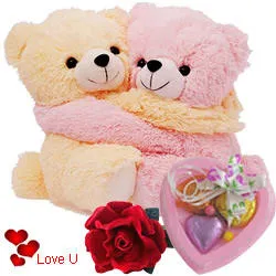 Cute Hugging Couple Teddy with 1 Velvet Rose and 3 pcs Heart Homemade Chocolate