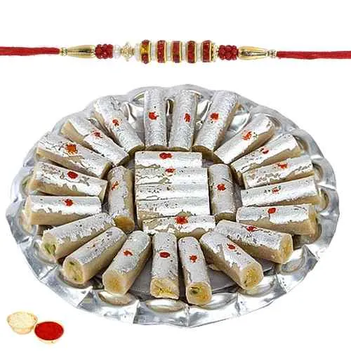 Mesmerizing Rakhi with Kaju Pista Roll Gift Set Mesmerizing Rakhi with Kaju Pista Roll Gift Set