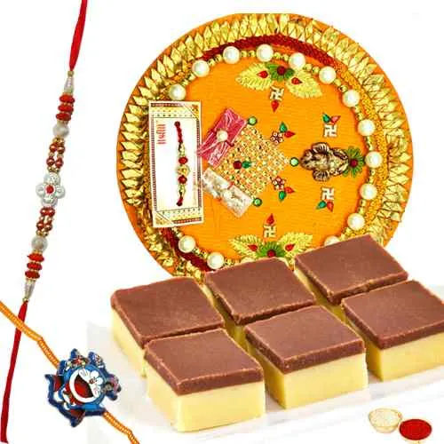 Astonishing Gift of Chocolate Barfi, Rakhi Thali with One Fancy Rakhi and One Kids Rakhi Astonishing Gift of Chocolate Barfi, Rakhi Thali with One Fancy Rakhi and One Kids Rakhi