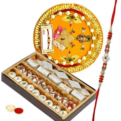 Flattering Selection of One Assorted Mithai Pack, One Rakhi Thali and One Fancy Rakhi