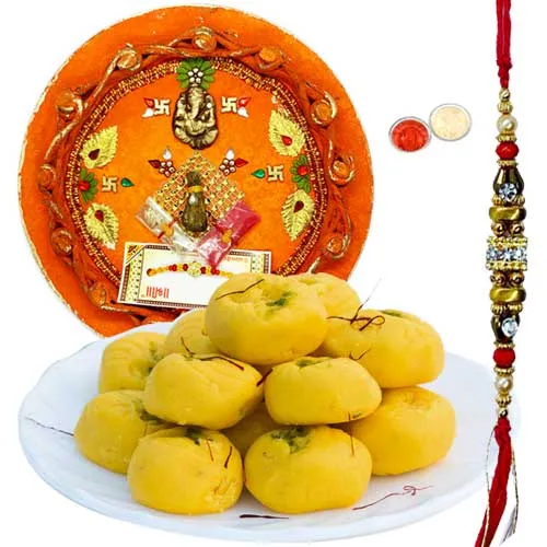 Free Rakhi with Delicious Kesar Pedas and Designer Pooja Thali Free Rakhi with Delicious Kesar Pedas and Designer Pooja Thali