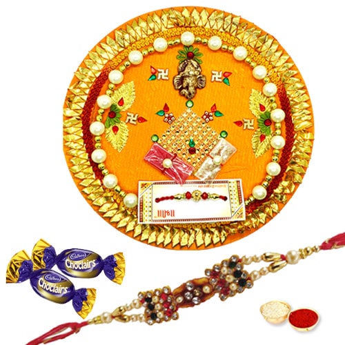 Breathtaking Rakhi Thali with Rakhi and Chocolates Breathtaking Rakhi Thali with Rakhi and Chocolates