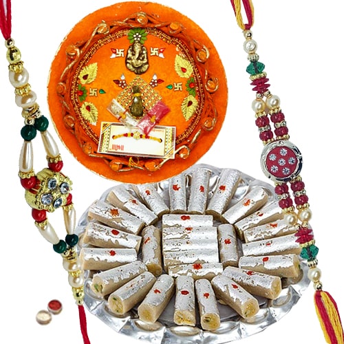 Rakhi Thali with Rakhis, Kaju Pista Roll and Roli Tikka<br><font color=#0000FF>Free Delivery in USA</font> Rakhi Thali with Rakhis, Kaju Pista Roll and Roli Tikka<br><font color=#0000FF>Free Delivery in USA</font>