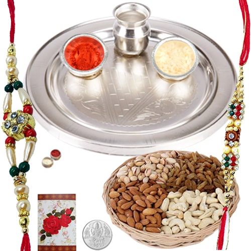 Rakhi Thali with Rakhis and Dry Fruits for Auspicious Occasion Rakhi Thali with Rakhis and Dry Fruits for Auspicious Occasion