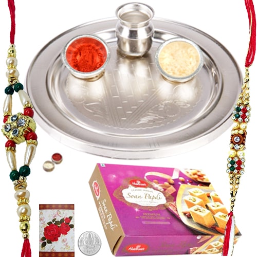 Delightful Rakhi Teamed with Thali and 250 Gms. Soan Papdi from Haldiram Delightful Rakhi Teamed with Thali and 250 Gms. Soan Papdi from Haldiram