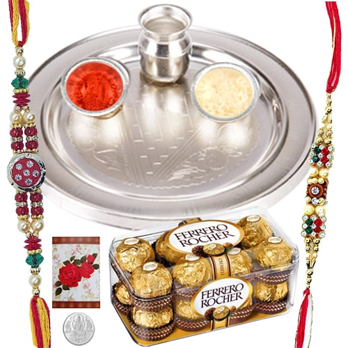 Appealing 2 Rakhis with 5 Inch. Silver Thali and 12 Ferrero Rocher Appealing 2 Rakhis with 5 Inch. Silver Thali and 12 Ferrero Rocher