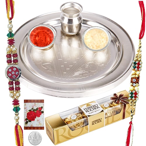 Beautiful Silver Thali with 2 Rakhis, 3 Ferrero Rocher Choco and a Free 5 Gm. Silver Coin Beautiful Silver Thali with 2 Rakhis, 3 Ferrero Rocher Choco and a Free 5 Gm. Silver Coin