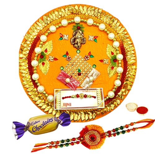 Magnificent Rakhi and Thali with Flavor of Fraternity Chocolates Magnificent Rakhi and Thali with Flavor of Fraternity Chocolates
