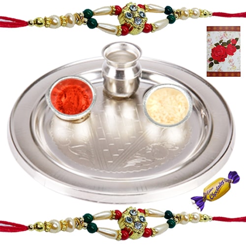 Admirable Silver Thali with 2 Band of Rakhis and Chocolates Admirable Silver Thali with 2 Band of Rakhis and Chocolates