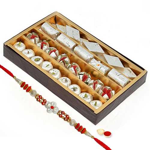 Assorted Sweets and One Designer Rakhi with free Roli Tikka Assorted Sweets and One Designer Rakhi with free Roli Tikka