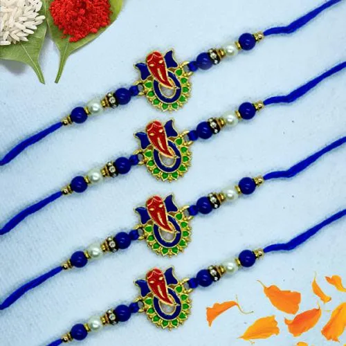 Astonishing Four Ganesh Rakhi Set with Roli, Chawal Teeka n Card Astonishing Four Ganesh Rakhi Set with Roli, Chawal Teeka n Card