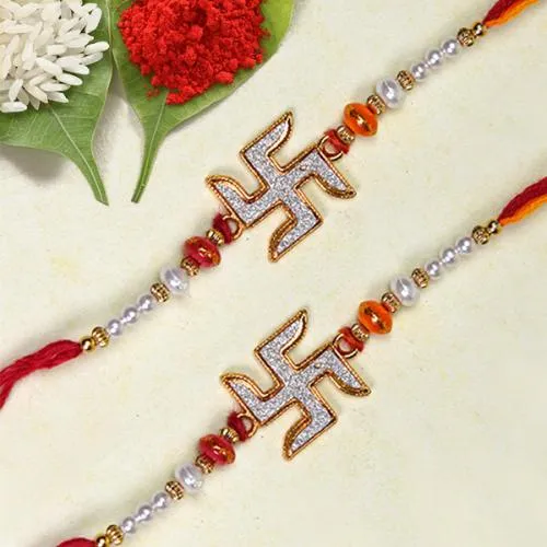 Auspicious Swastik Rakhi Pair with Roli Chawal Tika n Card Auspicious Swastik Rakhi Pair with Roli Chawal Tika n Card