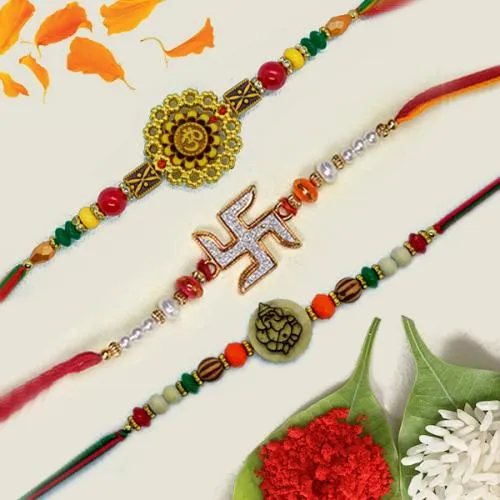 Auspicious Trio of OM, Swastik and Ganesh Rakhi Auspicious Trio of OM, Swastik and Ganesh Rakhi
