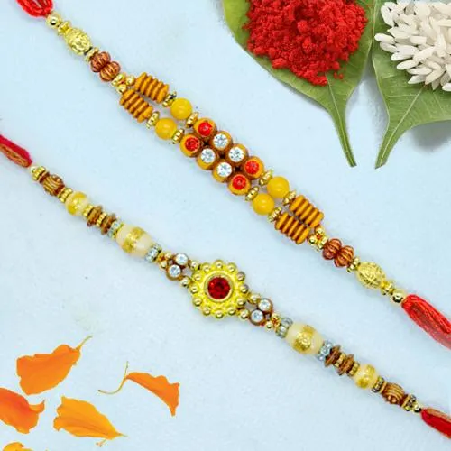 Dashing Pair of Fancy Rakhi with Roli, Chawal n Card Dashing Pair of Fancy Rakhi with Roli, Chawal n Card
