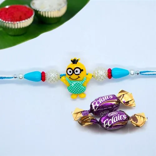 Fancy Kids Rakhi with 2 Chocolates, Roli, Chawal Tika n Card Fancy Kids Rakhi with 2 Chocolates, Roli, Chawal Tika n Card