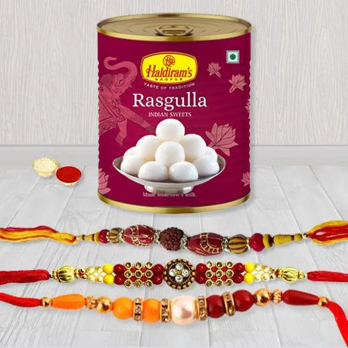 Enticing Set of 3 Rakhi with Haldiram Rasgulla Enticing Set of 3 Rakhi with Haldiram Rasgulla