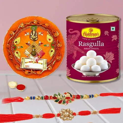 Exclusive Rakhi Set of 2 with Haldiram Rasgulla n Puja Thali Exclusive Rakhi Set of 2 with Haldiram Rasgulla n Puja Thali