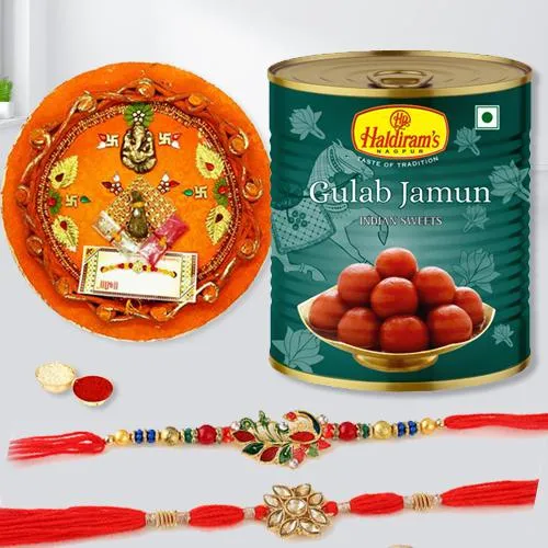 Splendid Set of 2 Rakhi with Gulab Jamun n Puja Thali Splendid Set of 2 Rakhi with Gulab Jamun n Puja Thali