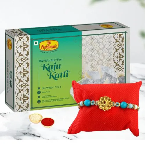 Delectable Pack of Kaju Katli with Rakhi N Free Roli Chawal