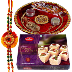 Auspicious Rakhi with Puja Thali and 100 gm. Soan Papri Auspicious Rakhi with Puja Thali and 100 gm. Soan Papri