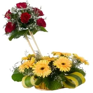 Eye-Catching and Designer Arrangement of Eight Gerberas and Seven Roses with Isle Of Style