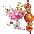 Beautiful Purple Orchids in Vase with a Free Rakhi Beautiful Purple Orchids in Vase with a Free Rakhi